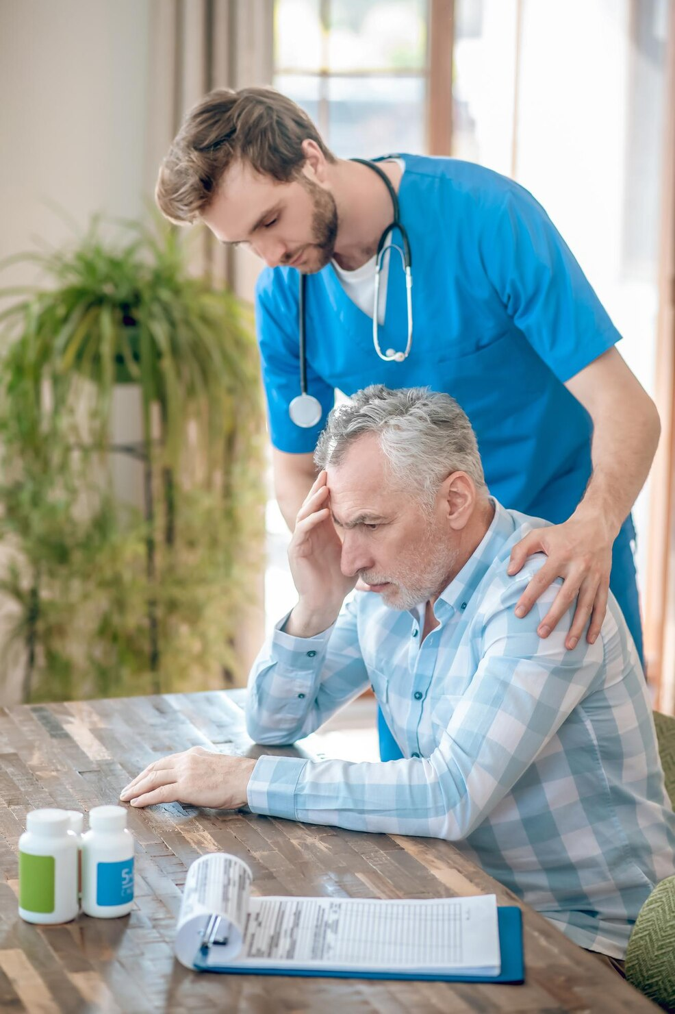 Doctor assisting patient